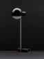 Preview: Minimalistischer Tecta Z10 Garderobenständer in Schwarz mit Cognac-Kernleder-Manschette Preview: Minimalistischer Tecta Z10 Garderobenständer in Schwarz mit Cognac-Kernleder-Manschette