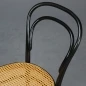 Preview: Thonet 214 Bugholz Stuhl in Schwarz mit patiniertem Wiener Geflecht gebraucht