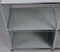 Preview: USM Haller Regal in Mittelgrau mit vier offenen Fächern gebraucht