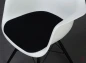 Preview: Vitra Eames Plastic Armchair in Weiß mit schwarzem Sitzpolster gebraucht