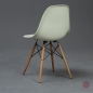 Preview: Vitra Fiberglas DSW Side Chair in Parchment beige mit Holz Gestell gebraucht