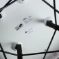 Preview: Vitra Eames Plastic Armchair in Weiß mit schwarzem Sitzpolster gebraucht