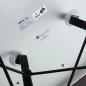 Preview: Vitra Eames Plastic Armchair in Weiß mit schwarzem Sitzpolster gebraucht