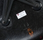 Preview: Herman Miller Eames Armchair mit schwarzer Fiberglas und Drehgestell gebraucht Hersteller Logo Orange