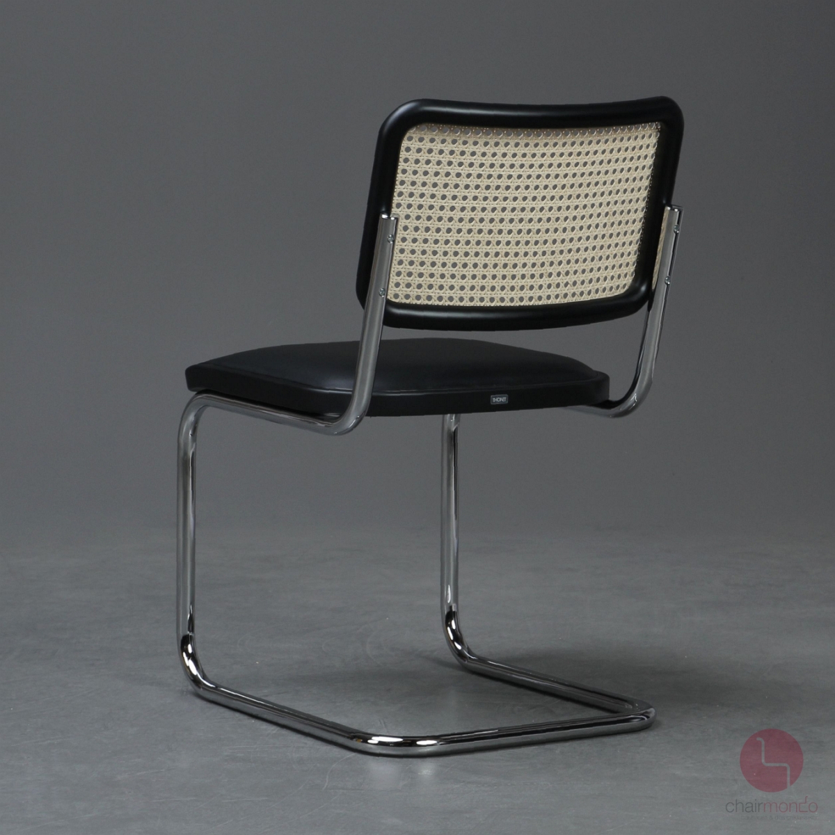 Preview: Thonet S32 SP Freischwinger Leder Polster Schwarz mit Geflecht Rücken gebraucht