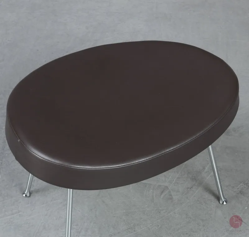 Vitra Coconut Chair mit Ottoman Leder Braun gebraucht