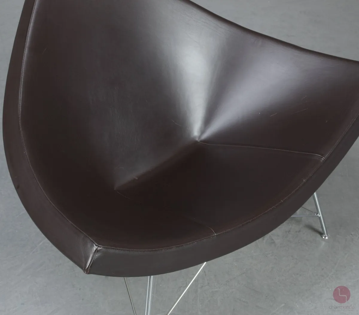 Vitra Coconut Chair mit Ottoman Leder Braun gebraucht