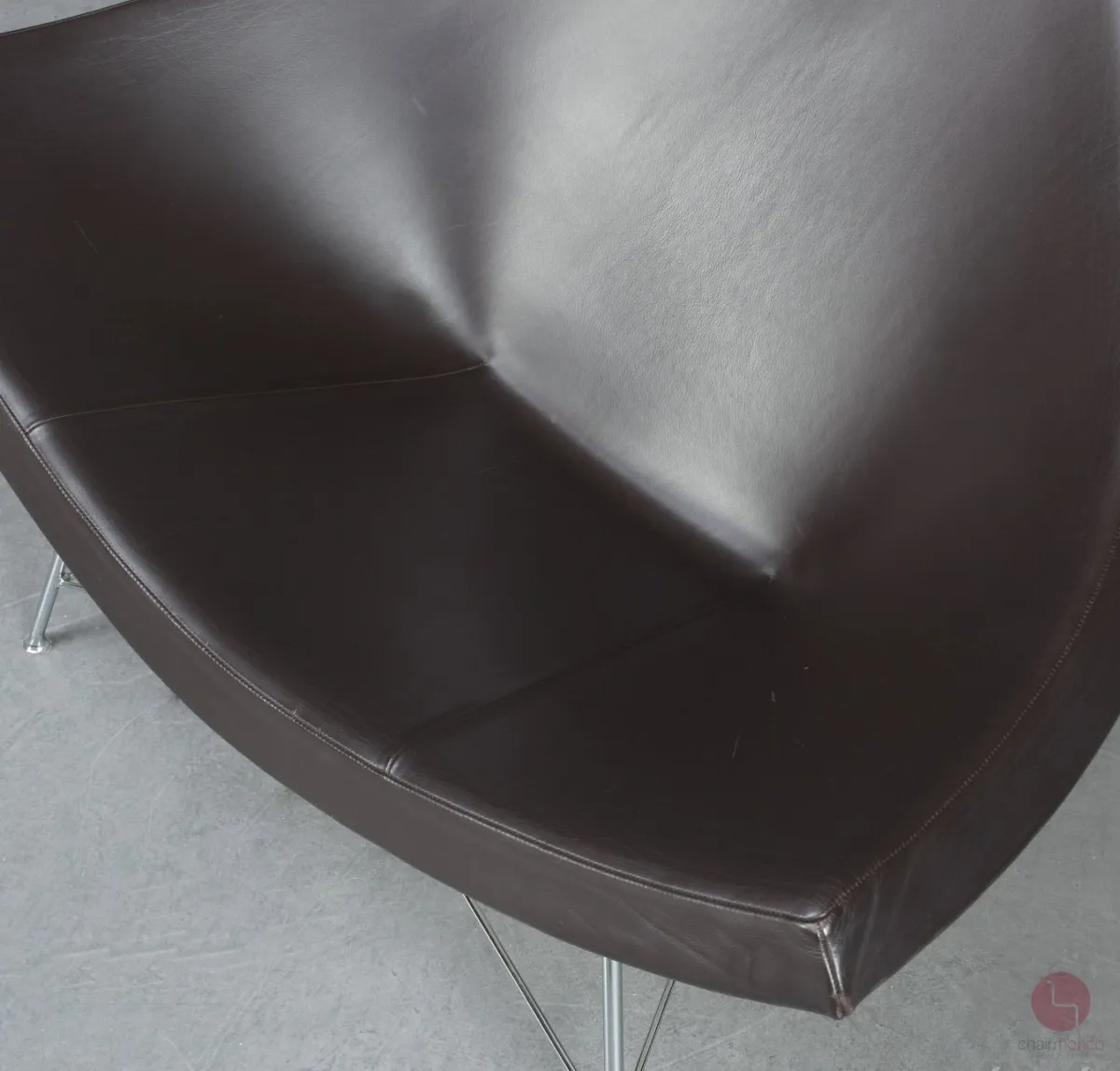 Vitra Coconut Chair mit Ottoman Leder Braun gebraucht